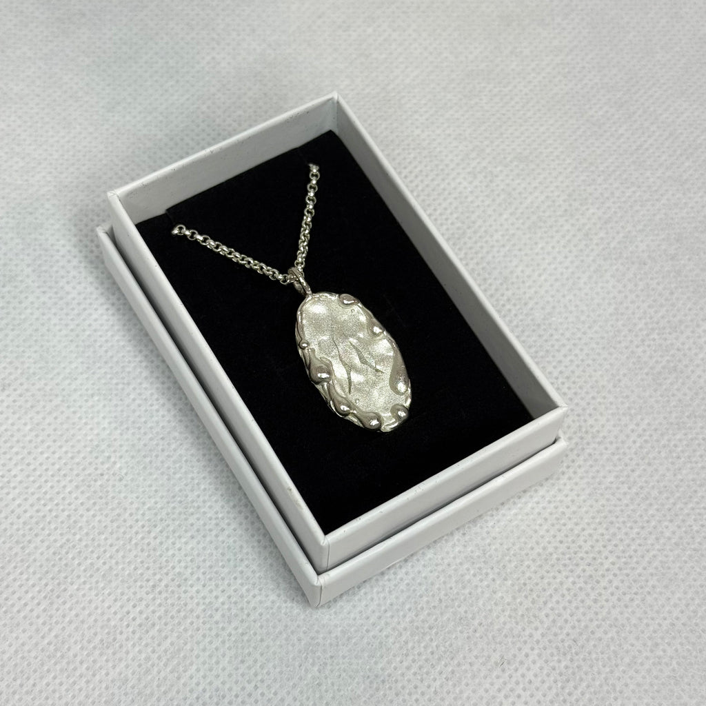 EXOTIKA Core Pendant